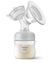 Mother using Philips Avent rechargeable pump cord-free while sitting on couch without wall outlet