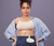 Elvie Stride fitting discreetly inside standard nursing bra for hands-free pumping