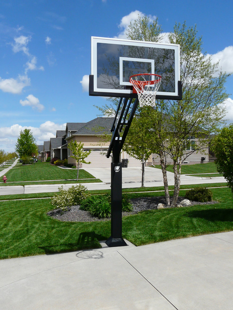 NBA 72 inch In-Ground Adjustable Basketball Hoop with Tempered Glass Backboard, Padded Pole, Ball Return