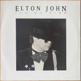 The vinyl record album artwork of Elton John's Ice On Fire LP