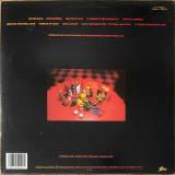 Actual image of the back cover of The Fabulous Thunderbirds's Hot Number second hand vinyl record taken in our record shop