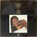 Actual image of the back cover of Marcia Hines's Take It From The Boys second hand vinyl record taken in our record shop
