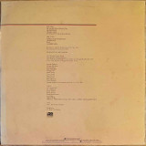 Actual image of the back cover of Bette Midler's Thighs And Whispers second hand vinyl record taken in our record shop