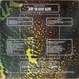 Actual image of the back cover of Dennis Garcia's Jive To Stay Alive second hand vinyl record taken in our record shop