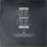 Actual image of the back cover of Various's Heavy second hand vinyl record taken in our Melbourne record shop