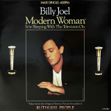 Actual image of the vinyl record album artwork of Billy Joel's Modern Woman LP - taken in our Melbourne record store