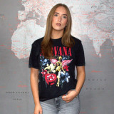 Picture of model wearing  the Nirvana Unisex Stone Wash T-Shirt: In Utero Vintage Collage (Black)