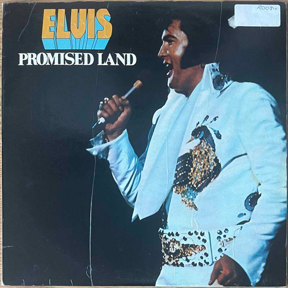Actual image of the vinyl record album artwork of Elvis Presley's Promised Land LP - taken in our record store