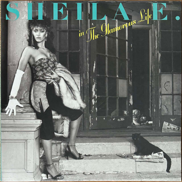 Actual image of the vinyl record album artwork of Sheila E.'s In The Glamorous Life LP - taken in our Melbourne record store