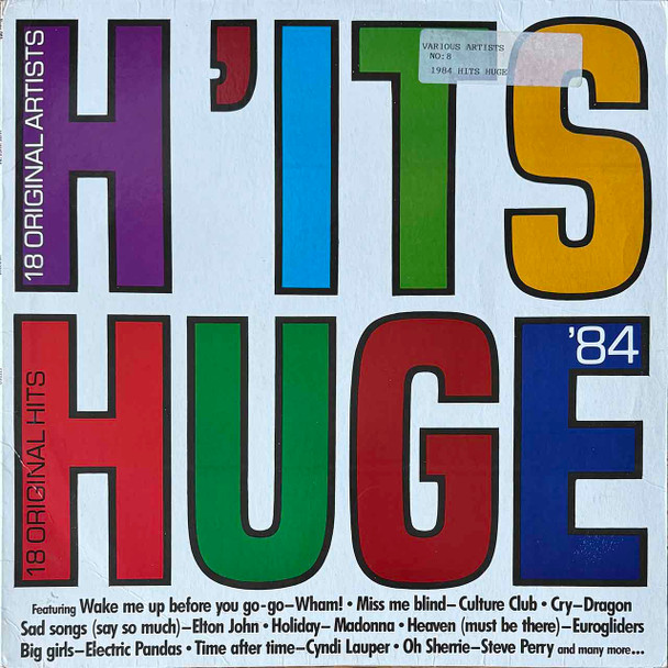 Actual image of the vinyl record album artwork of Various's H'its Huge '84 LP - taken in our Melbourne record store