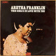 The vinyl record album artwork of Aretha Franklin's This Girl's In Love With You LP
