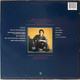 Actual image of the back cover of Robben Ford's Talk To Your Daughter second hand vinyl record taken in our record shop