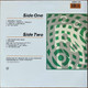 Actual image of the back cover of Genesis's Invisible Touch second hand vinyl record taken in our Melbourne record shop