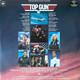 Actual image of the back cover of Various's Top Gun (Original Motion Picture Soundtrack) second hand vinyl record taken in our Melbourne record shop