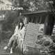 Actual image of the back cover of Linda Ronstadt's Hand Sown... Home Grown second hand vinyl record taken in our Melbourne record shop