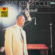 Actual image of the vinyl record album artwork of Nat King Cole's Unforgettable LP - taken in our Melbourne record store