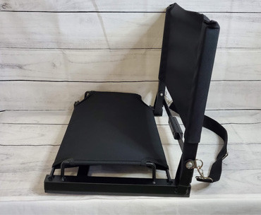 The stadium chair folds up easily. It comes with a detachable shoulder strap and carry grip for easy carrying.