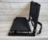 The stadium chair folds up easily. It comes with a detachable shoulder strap and carry grip for easy carrying.