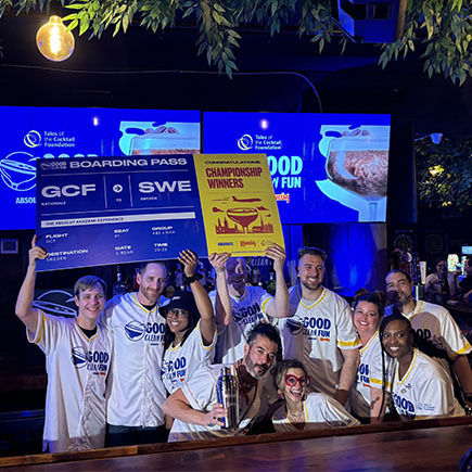 Customers celebrating being tournament champions in custom CHAMPRO baseball jerseys.
