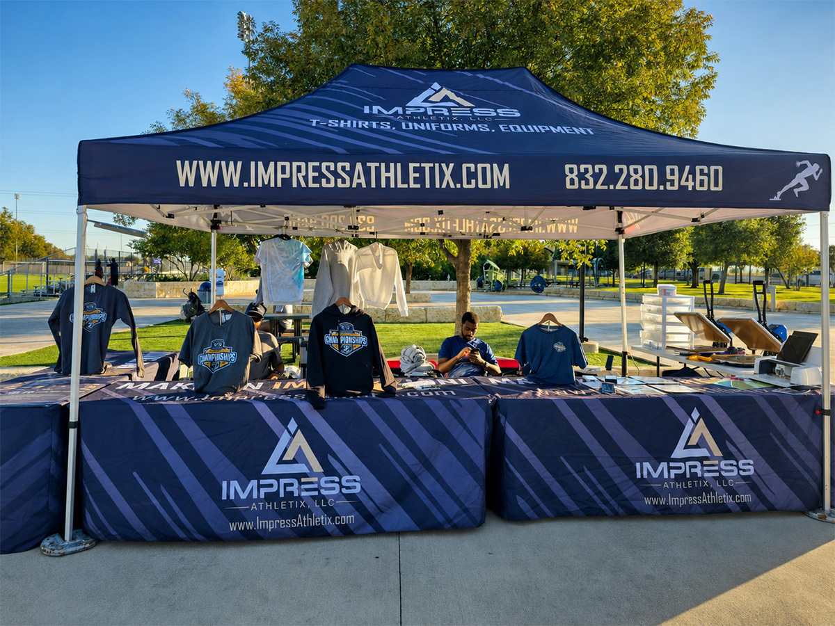 Impress Athletix outdoor on-site event merchandise setup
