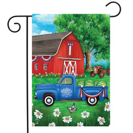 Briarwood Lane small printed garden flag with colorful springtime scene on bright blue sunny lawn.