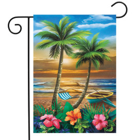 Briarwood Lane small printed garden flag with colorful beach scene, palm trees, and umbrella on sand.