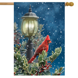 Briarwood Lane Winter Solitude Cardinal perched on holly under snowy lamp post with berries.