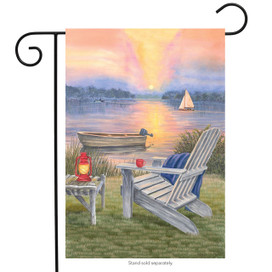 Briarwood Lane summer garden flag with Adirondack chair, boat, and sunset on a lake scene.