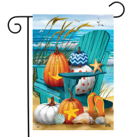 Briarwood Lane garden flag with pumpkins, gourds, and seashells on a beach Adirondack chair.