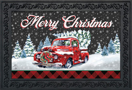 Briarwood Lane Merry Christmas doormat with red truck and snowy trees, festive holiday decor.