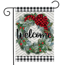 Briarwood Lane small Welcome garden flag with winter wreath, berries, spruce, and checkered bow decoration.
