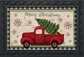 Briarwood Lane Merry Christmas Pickup Truck Doormat with red truck and spruce on checkered background.
