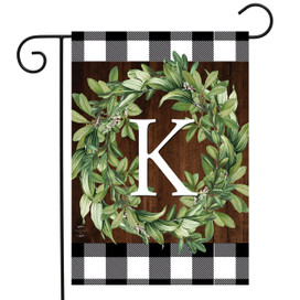 Briarwood Lane Wreath Monogram K Garden Flag with greenery and checkered border for porch display.