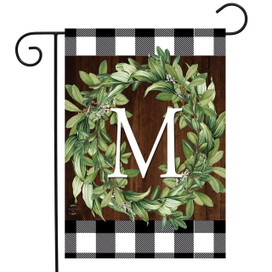 Briarwood Lane Wreath Monogram Garden Flag with greenery, monogrammed M on plaid background.