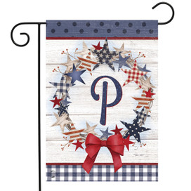 Briarwood Lane American Wreath Monogram P Garden Flag with red bow and blue stars and stripes.