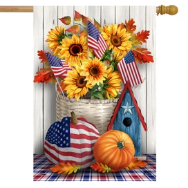 Briarwood Lane American Autumn House Flag with sunflowers, pumpkins, and patriotic decor on white wood.