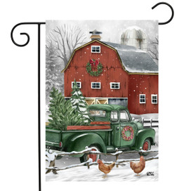 Briarwood Lane Christmas on the Farm Garden Flag with green truck and red barn winter scene.