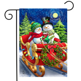 Briarwood Lane Dashing Through Snow Garden Flag with snowmen on sleigh under starry night sky.