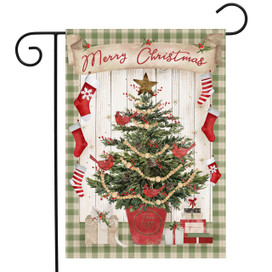 Briarwood Lane Merry Christmas garden flag with potted tree, stockings, and presents on green plaid background.