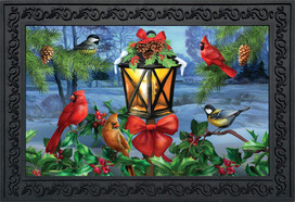 Briarwood Lane Lantern Glow Gathering Doormat with festive birds, lantern, and holly in a black frame.