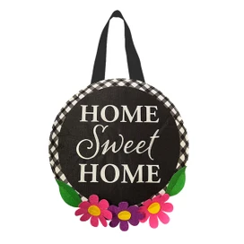 Briarwood Lane Home Sweet Home Flowers Door Hanger with colorful pink, purple flowers and black straps.
