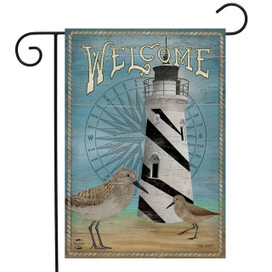 Briarwood Lane Welcome Lighthouse Garden Flag with birds and nautical design on blue background.