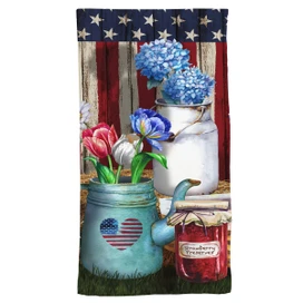 Briarwood Lane American Picnic Hand Towel with patriotic floral design on a rustic background.
