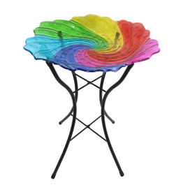 Briarwood Lane Rainbow Swirl Glass Bird Bath with colorful swirled glass top on black metal stand.