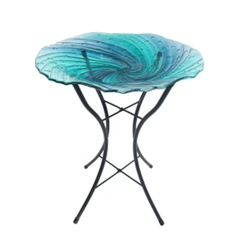 Briarwood Lane Blue Swirl Glass Birdbath with black metal stand and vibrant turquoise blue glass top.