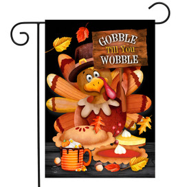 Briarwood Lane Gobble Turkey Garden Flag with colorful turkey and festive fall decorations and sign.