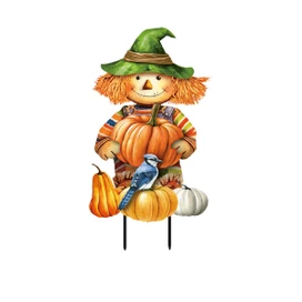 Smiling Scarecrow Metal Art with orange hair, green hat, sitting on pumpkins with blue bird.