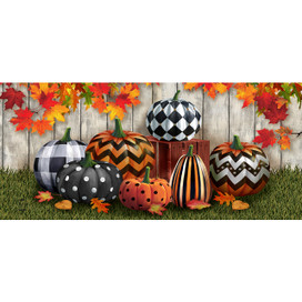 Patterned Pumpkins Mini Mat with various colorful designs on pumpkins against a wooden fence background.