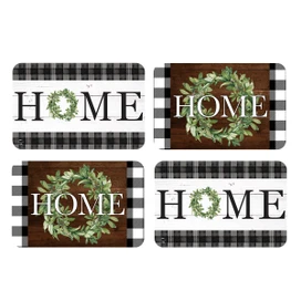 Four black and white plaid Farmhouse Placemats with green wreath and HOME text design.