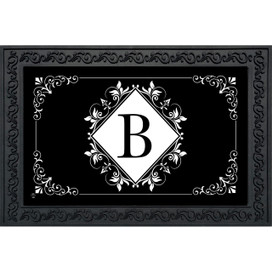 Black and white monogram doormat with floral design and large B, decorative border on black background.